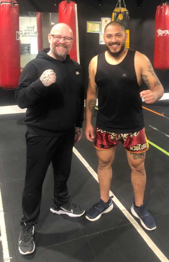 Angels boxing club coaches Reg Byrne and Thai Boxing coach in boxing gym in Dublin